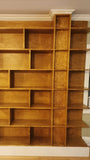 MCM inspired bookcase for a living/dining area - open concept space!   7 ft wide shelves running through from one end to another with open ends.  A  multi functional  sturdy & solidly build from maple plywood standing 8ft tall.