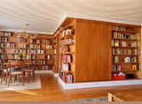 A librarian's (our client) dream home library and TV Unit. Incredible MCM inspired library/ bookcase and built in TV unit featuring a stunning sliding door. The bookcase which stretches over 30ft ​ boast ​seven shelves ​running all the way through ​offering plenty of ​ ​display space for books, art, ​etc​ TV unit is hidden with a beautiful 54" wide sliding door oozing out Danish charm and practicality.