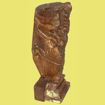 Mounted hand carved solid teak wood bracket.