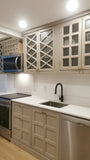 Custom kitchen with wood door & drawer fronts and stainless steel appliances