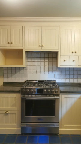 A 20 year old kitchen was brought back to life by respraying all the upper cabinets and replacing  MDF doors & frame for the base cabinets  in around sink , stove & dishwasher ( which were damaged from water and daily use) with solid wood doors.  To make the kitchen more functional couple base cabinets were turned into drawer units.  Broom cabinet was tuned into a pull-out pantry!