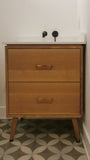   Custom built mid century modern inspired 30" solid white oak wood vanity​ cabinet​, featuring 2 ​soft close inset drawers ​and​ solid wood tapered legs. ​ ​  An elegant, luxurious​ and stunning addition to any bathroom.
