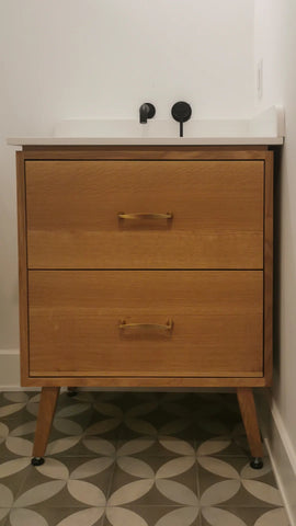   Custom built mid century modern inspired 30" solid white oak wood vanity​ cabinet​, featuring 2 ​soft close inset drawers ​and​ solid wood tapered legs. ​ ​  An elegant, luxurious​ and stunning addition to any bathroom.