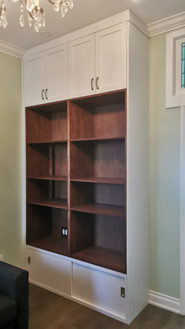 Custom floor-to-ceiling storage cabinet to make the most of every inch! A spacious bottom section featuring sliding doors (perfect for tight spaces), for any items you want to keep out of sight. Open shelving - ideal for favorite decor pieces, books , bar or electronics. The top portion with doors, providing space for items you prefer to tuck away. Design & tailored to specific needs, combining functionality with elegant aesthetics.