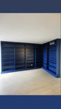 This project is a definition of a dream home library.

This custom bookcase stretches over 17 feet and features seven continuous shelves, offering ample display space for books, art, and collectibles. It is a perfect example of how our custom cabinetry can transform a space.