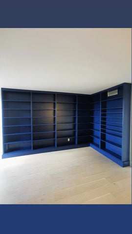 This project is a definition of a dream home library.

This custom bookcase stretches over 17 feet and features seven continuous shelves, offering ample display space for books, art, and collectibles. It is a perfect example of how our custom cabinetry can transform a space.