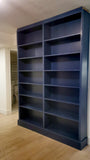 
​The 7-tier double ​​ blue bookcase offer​s ample room to elegantly showcase  books, cherished photo frames, and decorative treasures​. 