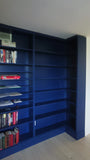 This project is a definition of a dream home library.

This custom bookcase stretches over 17 feet and features seven continuous shelves, offering ample display space for books, art, and collectibles. It is a perfect example of how our custom cabinetry can transform a space.