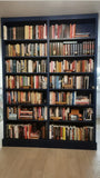 ​
The 7-tier double  blue bookcase offers ample room to elegantly showcase  books, cherished photo frames, and decorative treasures.