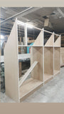A closet design   specifically tailored to fit rooms with sloped or slanted ceilings, featuring beveled shaker doors. The design maximizes storage while creating both a functional and beautiful space.