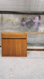This mid-century inspired deskcrafted from quarter sawn oak wood.  One soft close drawer with integrated lip handle.