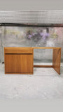 This mid-century inspired deskcrafted from quarter sawn oak wood.  One soft close drawer with integrated lip handle.
