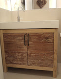 This gorgeous clean line bathroom vanity cabinet is custom designed & built to fit an existing vanity top.  Frame build from poplar wood and door panels from reclaimed teak wood.  -34" x 20 " x 28" (ht)