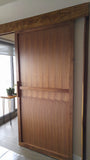 Walnut sliding door featuring top of the line hardware to make it smoothest sliding door.