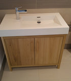 TThis gorgeous clean line bathroom vanity cabinet.  Custom designed & built to fit an existing floating vanity top.  Frame & door panels built from solid polar wood,  -34" x 20 " x 28" (ht)