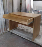 Custom build  desk to fit a home studio with limited space. Its modern design sports a slide-out for keyboard with a spacious top to position computer monitor and studio monitors. 