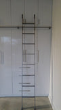 Modern white closet boasts custom built metal ladder and a 7ft long metal rail .  Ladder with multiple hooks was specially designed so it can be used not only for the tall  closet in the bedroom but also in the kitchen. Allowing  for maximum versatility on multiple rails and to store it elsewhere.