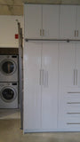Modern white closet boasts custom built metal ladder and a 7ft long metal rail .  Ladder with multiple hooks was specially designed so it can be used not only for the tall  closet in the bedroom but also in the kitchen. Allowing  for maximum versatility on multiple rails and to store it elsewhere.