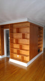 A librarian's (our client) dream home library and TV Unit.  Incredible MCM inspired library/ bookcase and built in TV unit featuring a stunning sliding door.  The bookcase  which stretches over 30ft ​ boast ​seven shelves ​running all the way through ​offering plenty of ​ ​display space for books, art, ​etc​  TV unit is hidden with a beautiful 54" wide sliding door oozing out Danish charm and practicality.