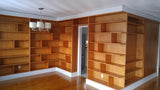 A librarian's (our client) dream home library and TV Unit.  Incredible MCM inspired library/ bookcase and built in TV unit featuring a stunning sliding door.  The bookcase  which stretches over 30ft ​ boast ​seven shelves ​running all the way through ​offering plenty of ​ ​display space for books, art, ​etc​  TV unit is hidden with a beautiful 54" wide sliding door oozing out Danish charm and practicality.