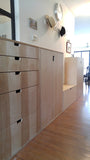 This beautiful clean line unit transformed this hallway into a space to store shoes.  A 5 drawer dresser with a glass panel extends the hallway and add much needed additional storage!!  Built from Baltic birch plywood.  Benefits over standard plywood include;  - Improved stiffness, stability, and strength  - Void free core allows for a decorative exposed edge  - Exceptional screw holding capabilities  - Thicker face veneer