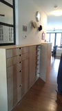 This beautiful clean line unit transformed this hallway into a space to store shoes.  A 5 drawer dresser with a glass panel extends the hallway and add much needed additional storage!!  Built from Baltic birch plywood.  Benefits over standard plywood include;  - Improved stiffness, stability, and strength  - Void free core allows for a decorative exposed edge  - Exceptional screw holding capabilities  - Thicker face veneer