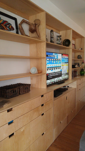  This handsome unit is built from baltic birch plywood.  Benefits over standard plywood include;  - Improved stiffness, stability, and strength  - Void free core allows for a decorative exposed edge  - Exceptional screw holding capabilities  - Thicker face veneer   Due to the nature of its construction, Baltic Birch is an incredibly durable product - it’s strong, stable, tough, and heavy. That makes it ideal for a number of woodworking projects.
