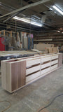 An absolutely spectacular 13 ft long MCM inspired dresser / bedroom unit. Custom build unit boast 9 soft close drawers with under mount slides and 2 door panels on either ends. Which can easily handle all storage needs with ease and still look splendid! Fronts built from beautiful walnut with exceptional grain pattern throughout. The vintage pulls and shell shape handles add a time less feel. A sleek and streamlined white exterior with recessed kick giving it the floating look