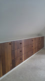 An absolutely spectacular 13 ft long MCM inspired dresser / bedroom unit.  Custom build unit boast 9 soft close drawers with under mount slides and 2 door panels on either ends. Which can easily handle all  storage needs with ease and still look splendid!  Fronts built from beautiful walnut  with exceptional grain pattern throughout.  The vintage pulls and shell shape handles add a time less feel.  A sleek and streamlined white exterior  with recessed kick giving it the  floating look   