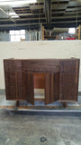   This 48" gorgeous MCM  inspired vanity features solid wood frame, legs and door & drawer fronts built from  walnut with exceptional grain pattern throughout.  Modern lines and beautiful  & warm wood grains makes it a perfect statement in any contemporary bathroom.  Two precisely inset doors and six functional drawers with soft-close slides offer plenty of storage for a growing family.  The counter top is a low maintenance and durable single edge white quartz  with an under-mount ceramic sink.