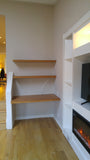 Don’t think you have the space for a home office? Think again  To make the most of the space, this nook was transformed into a home office by adding a floating desk and 2 floating shelving above it.  Built from solid white oak wood.