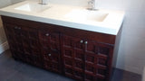 A custom build 60" vanity cabinet with one of a kind rose wood door & drawer fronts with a integrated sink.