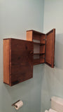Custom build medicine cabinets with reclaimed teak wood door fronts