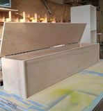 This blanket or storage trunk works great in the bedroom at the foot of the bed or as an entryway bench or as a seating in living room. This chest measure 78” long x 18” deep x 17”   It is made from maple plywood.