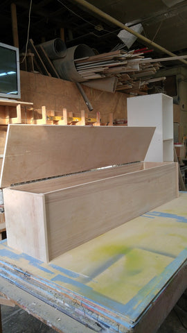 This blanket or storage trunk works great in the bedroom at the foot of the bed or as an entryway bench or as a seating in living room. This chest measure 78” long x 18” deep x 17”   It is made from maple plywood.