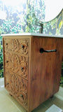 An absolutely gorgeous one of a kind  cabinet with hand carved rose wood drawer panels converted into a bathroom vanity with a white quartz top and oval ceramic sink.  - 24" x 24" x 35" (ht)