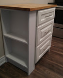 Emily moved into a house with a tiny kitchen that did not have a dishwasher. The natural place (and only place!) to put a dishwasher is to the left of the sink, but the 3 drawer cabinet was just shy of 24". So we stole few inches from the sink cabinet instead, to fit a full size dishwasher.  Turned the 3 drawers into an island so not to  loose any storage and for additional work surface.