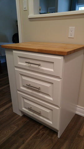 Emily moved into a house with a tiny kitchen that did not have a dishwasher. The natural place (and only place!) to put a dishwasher is to the left of the sink, but the 3 drawer cabinet was just shy of 24". So we stole few inches from the sink cabinet instead, to fit a full size dishwasher. Turned the 3 drawers into an island so not to loose any storage and for additional work surface.