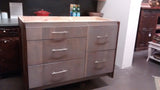 Kitchen island with reclaimed teak wood drawer fronts