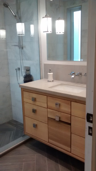 Made from poplar wood ,with clean line design & inset drawers, the floating vanity cabinet has a warm & contemporary look.