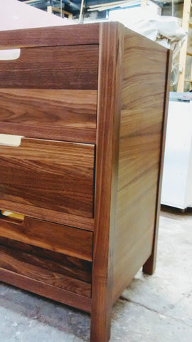 Solid walnut wood custom build vanity cabinet with 6 flat panel inset drawers.