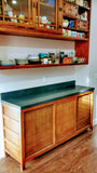 A clean line design with zen aesthetics!!! A stunning transformation from white big box store cabinets to unique Japanese inspired custom designed cabinets with hand-forged iron handles. The base cabinets has sliding doors with lattice design.
