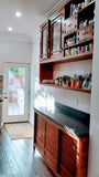 A clean line design with zen aesthetics!!! A stunning transformation from white big box store cabinets to unique Japanese inspired custom designed cabinets with hand-forged iron handles. The base cabinets has sliding doors with lattice design.