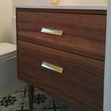 Custom build 30" solid walnut wood vanity​ cabinet​, featuring ceramic ​under-mount​ sink and white quartz countertop, ​soft closing drawers ​and​ solid wood tapered legs. ​ ​ An elegant addition to any bath space, unique and beautiful texture​d walnut wood makes ​b​bathroom classic,​ ​luxurious​ and stunning.