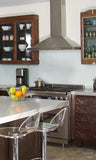 Old world elegance meets refined design!  This kitchen showcase hand crafted & elegantly hand carved base cabinets made from solid Indian rose wood, combined with an eclectic mix of vintage wall cabinets such  & one of a kind  narrow + shallow old medicine cabinet.
