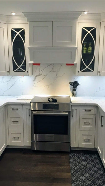 Shaker style cabinets are popular for their timeless style & ability to complement traditional, transitional & modern designs. Combined with distinctive glass front doors with intersecting narrow strips of wood that divide individual panes of glass – giving the cabinet doors an elegant demeanor well suited for showing off special pieces of china or silver.