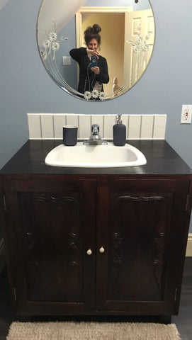 - Vanity cabinet with amazing hand carved rose wood door panels.  - 36" x 24" x 35" (ht)