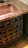 Joe's very unique kitchen with one of kind  rose wood door & drawer panels  and custom copper counter top & sink. Creating a rustic & farmhouse like ambience.
