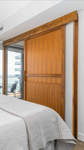 Have you recently bought a new condo with out a  door to the bedroom or den? Want to have privacy but want to maintain the open concept feel you fell in love with in the first place?  We built this gorgeous sliding door from walnut. It features top of the line hardware to make it smoothest sliding door.