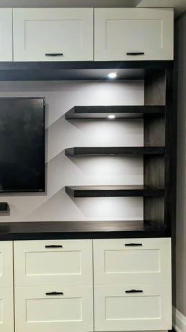 Modern & contemporary living room unit with lots of  storage and floating shelves to display items you love!